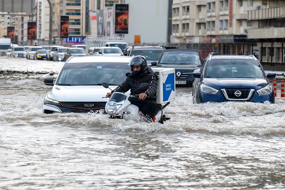 Look: UAE residents trudge through water-logged streets after heavy downpour